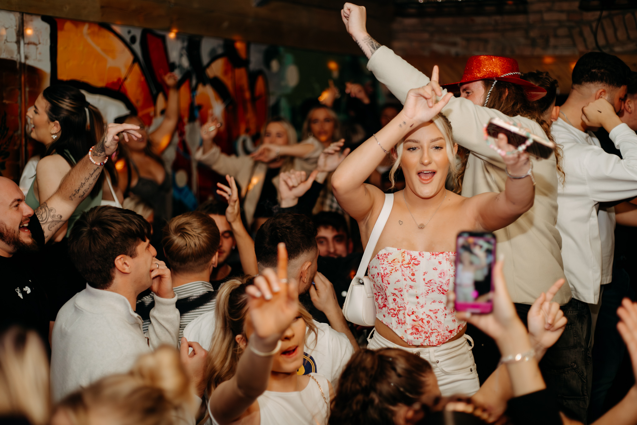 Guests dancing together at STEINS
