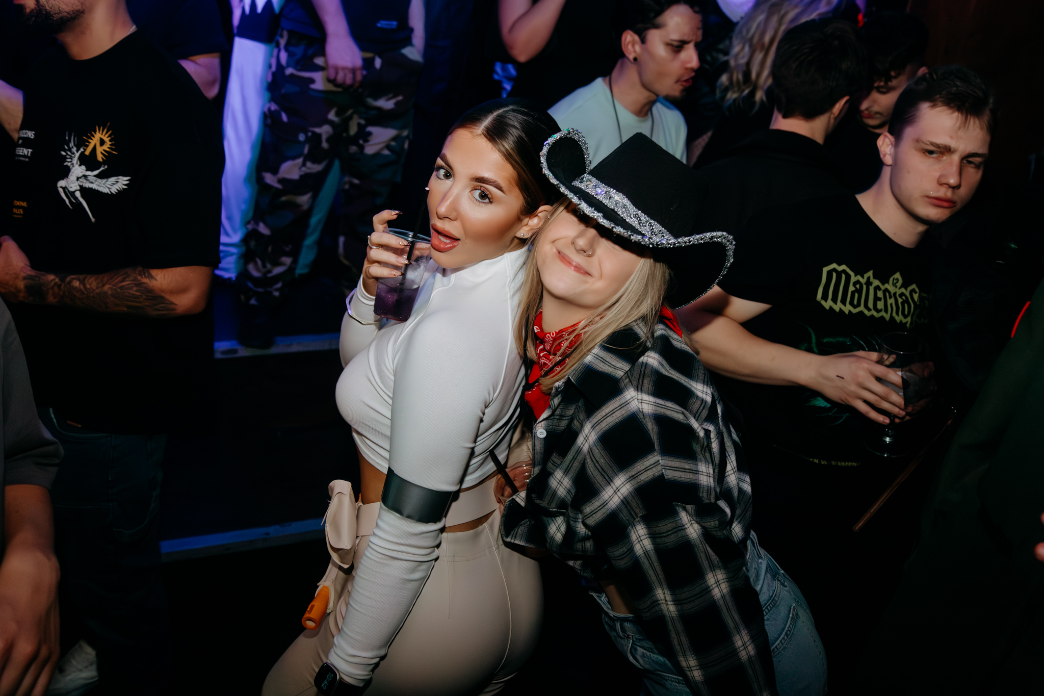 Two friends enjoying a lively night at STEINS